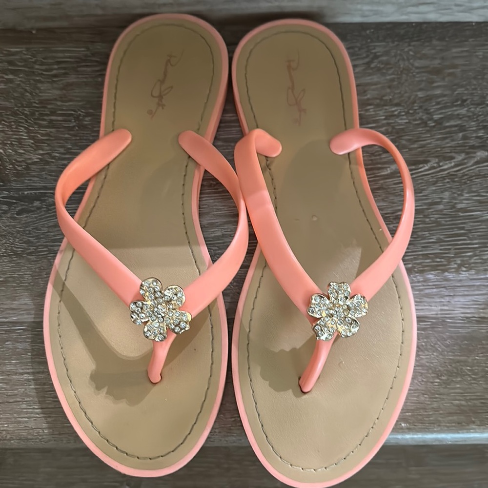 Ladies size 11 Panama Jack coral pink flip flop w/ rhinestone floral attachement